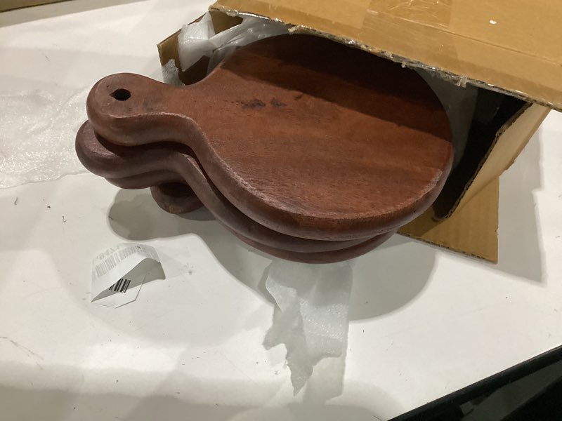 Condition photo showing Good Condition for the fine living co. set of 4 small appetizer serving plate, walnut charcuterie boards, acacia small round board, wood tray, mini serving board for cheese, meat, pizza, food-grade, 7"x5", 0.6" thick