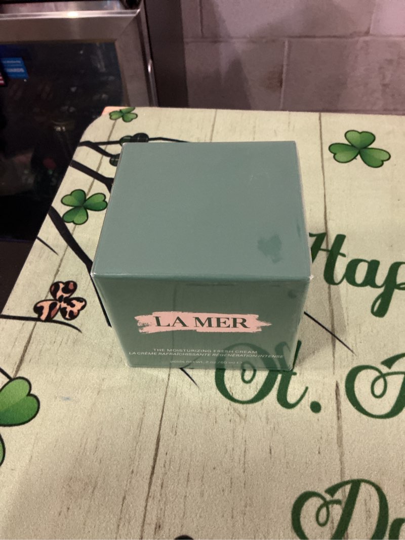 Condition photo showing New/Like New for moisturizing fresh cream by la mer for women - 2 oz cream