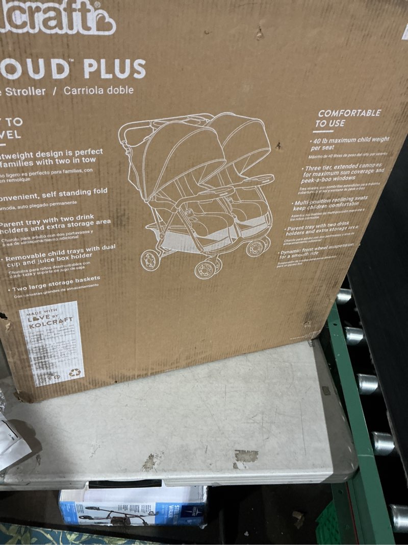 Condition photo showing Good Condition for Kolcraft Cloud Plus Lightweight Double Stroller Side-by-Side for Infant Toddler, Compact Folding Travel System with Reclining Seats, Canopies, Storage Basket, Trays, Easy Maneuver – Red Black