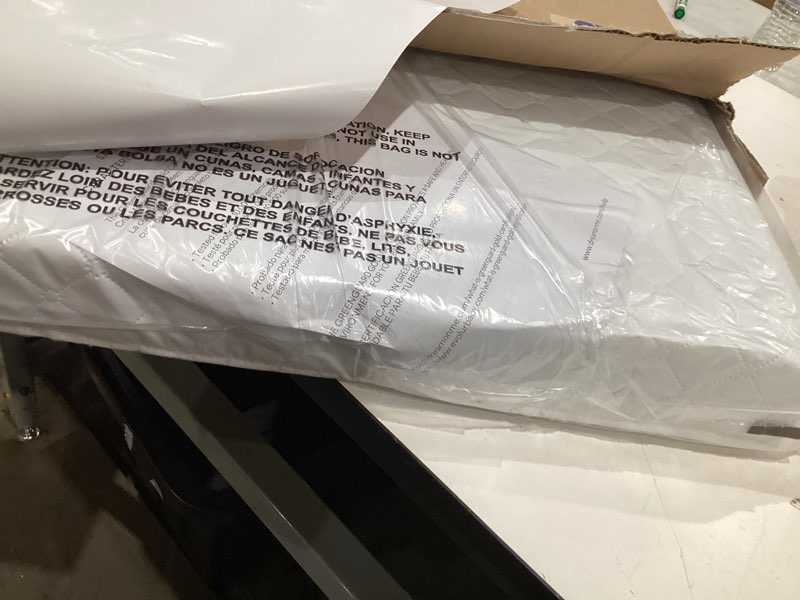 Condition photo showing Good Condition for dream on me holly 2-in-1 mini crib mattress, dual-sided infant & toddler, waterproof cover, greenguard gold certified, 38” x 24” x 3”, fits mini & select portable cribs, not for playards