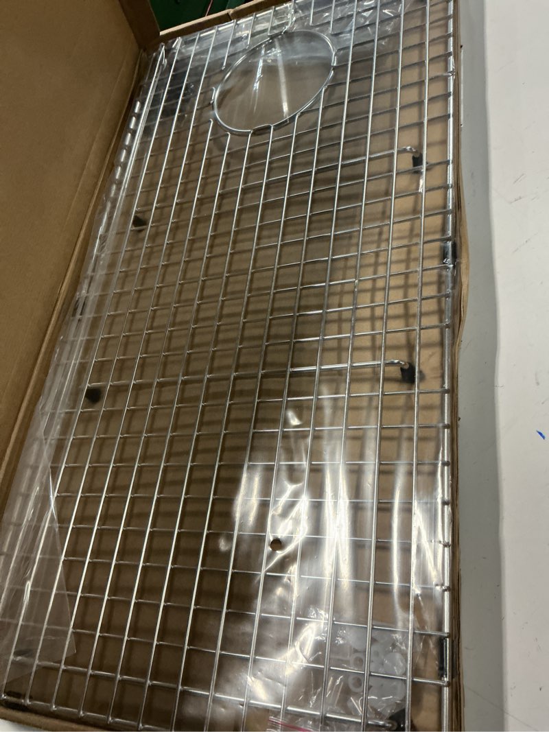 Condition photo showing Good Condition for serene valley sink bottom grid 26-15/16" x 14-1/16", side drain with corner radius 3/8",ndg2714s