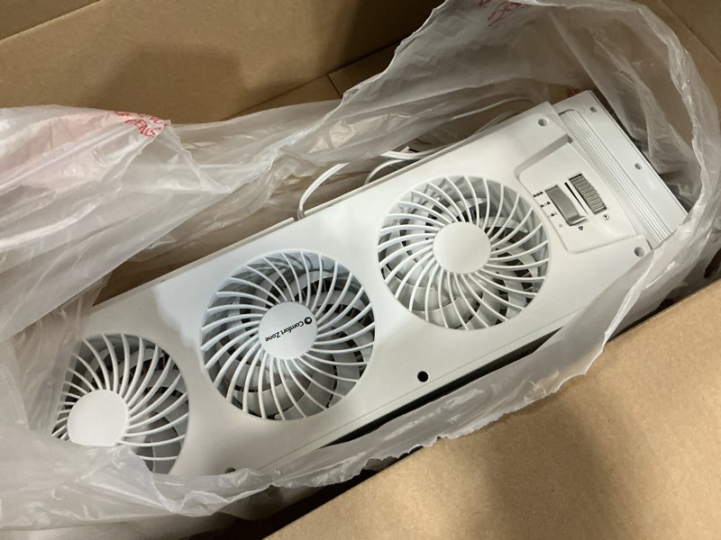 Condition photo showing As Is for comfort zone triple window fan with adjustable thermostat | 3-speed high-velocity cooling | horizontal or vertical manual control | fits double hung windows (min 25" x 8") | fully assembled | white