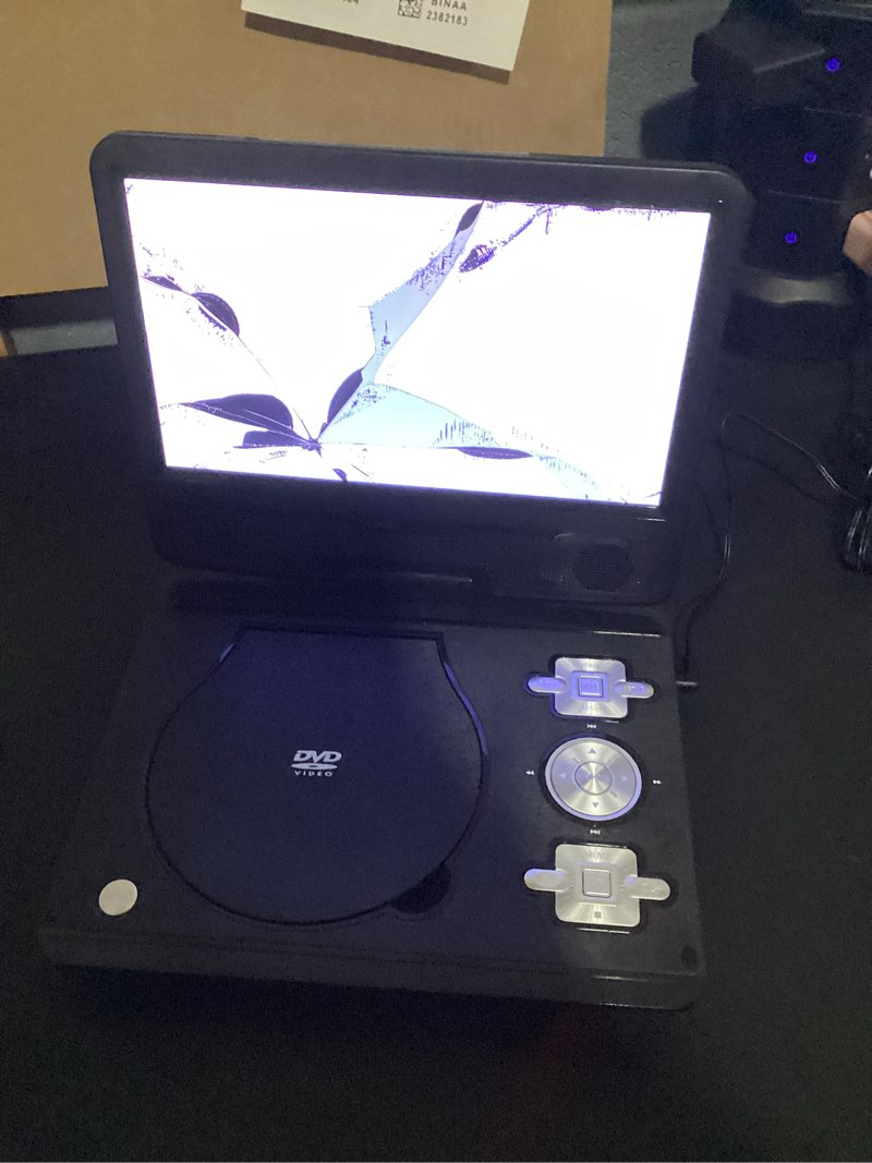 Condition photo showing As Is for screen display damaged onn 10-inch black 480p portable dvd player kit with screen swivel and built-in speakers