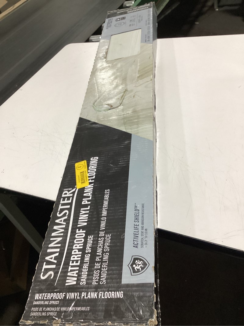 Condition photo showing Good Condition for STAINMASTER Sanderling Spruce 12-mil x 7-in W x 48-in L Waterproof Luxury Vinyl Plank Flooring  