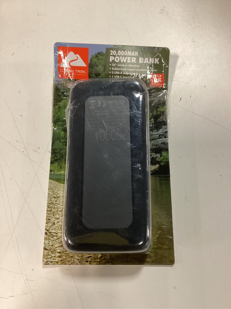 Condition photo showing As Is for ozark trail 20,000 mah qi wireless water-resistant power bank with charging pad, black