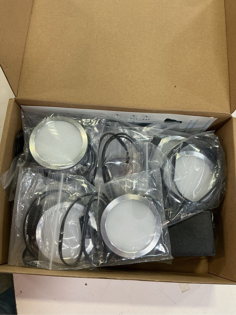 Condition photo showing Good Condition for kitchen cabinet undereath light kit, backsplash back lighting, 110v plugged in & hardwired, rf remote control dimmable, linkable, dual split, black wires, warm white 2700k,6 lights 6 lights, warm white