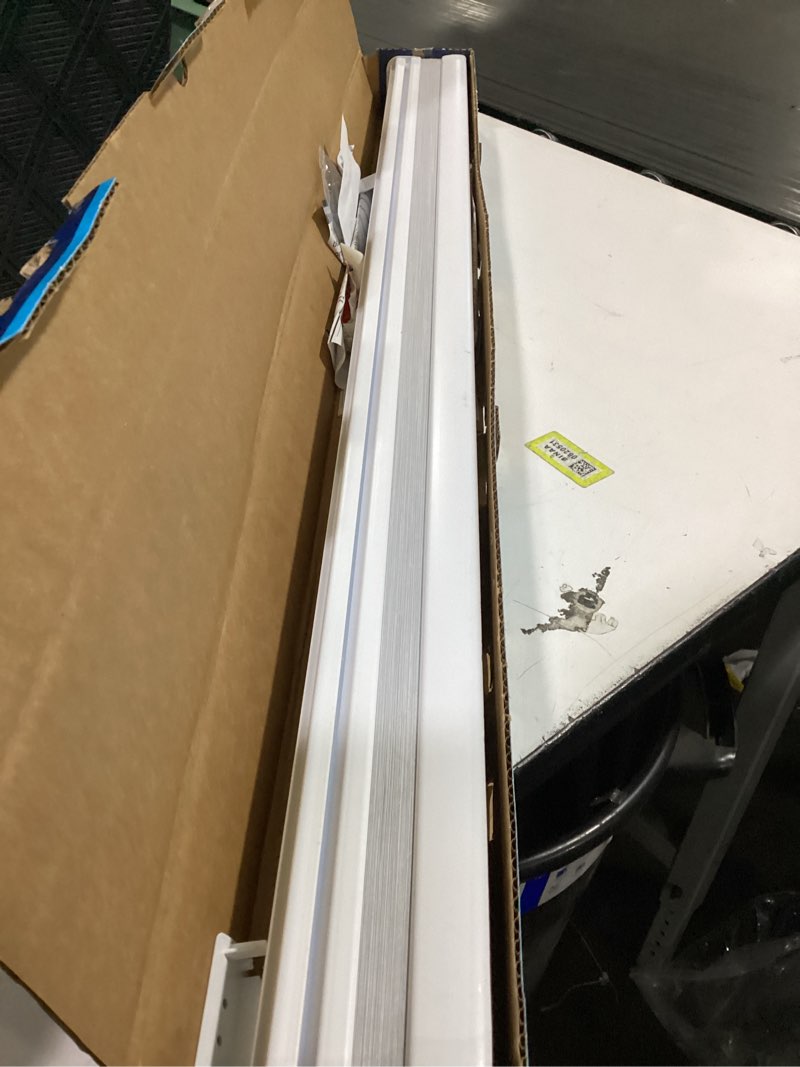 Condition photo showing As Is for levolor 36-in x 72-in snow blackout cordless cellular shade