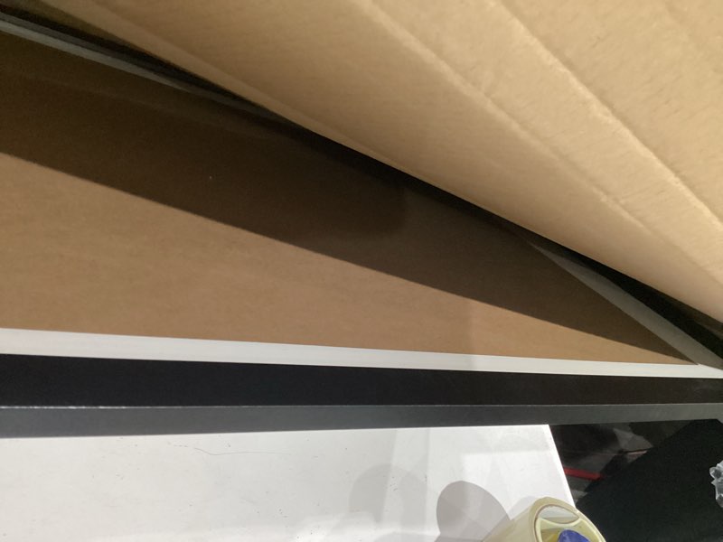 Condition photo showing Good Condition for lavie home 20x28 poster frame black, display pictures 18x24 with mat or 20x28 without mat, stable and sturdy picture frame with polished plexiglass, horizontal and vertical format of the wall?1 pack? 20x28 black