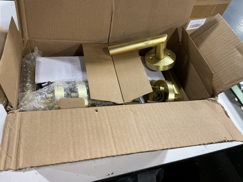 Condition photo showing As Is for goldenwarm gold door handles interior, privacy brushed gold interior door handles, heavy duty zinc alloy brushed brass door lever for bedroom and bathroom (6 pack) 6 pack privacy gold