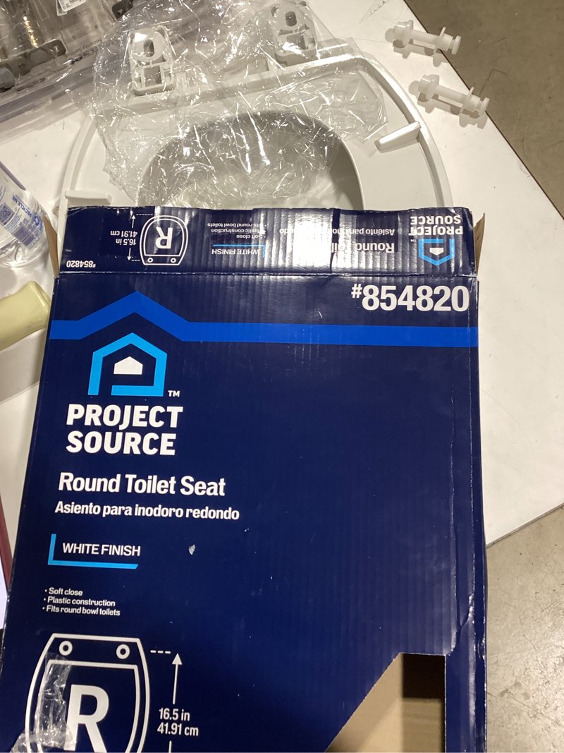 Condition photo showing As Is for project source plastic white round soft close toilet seat 