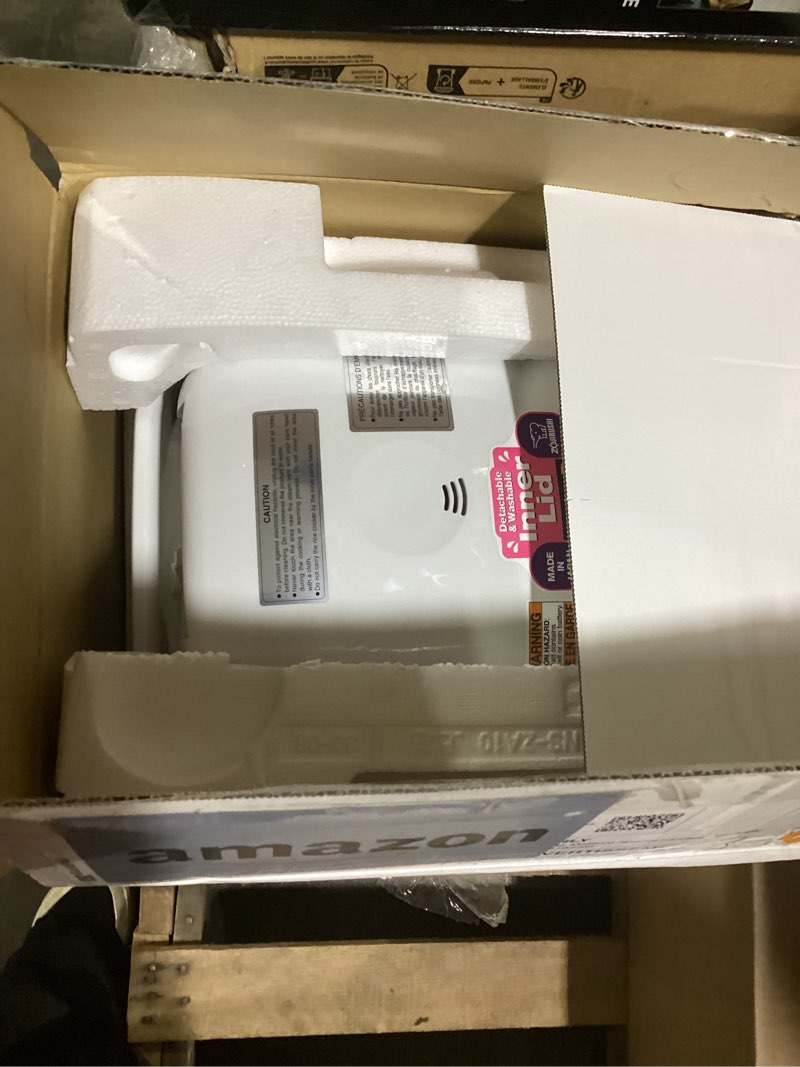 Condition photo showing Good Condition for Zojirushi NS-ZCC10 5-1/2-Cup Neuro Fuzzy Rice Cooker and Warmer, Premium White 5.5-Cup uncooked rice