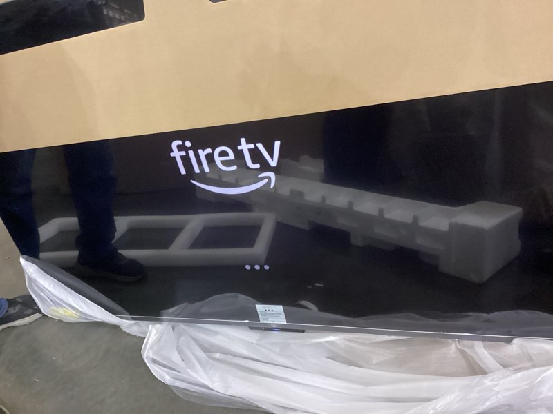 Condition photo showing New/Like New for Amazon Fire TV 75" Omni QLED Series (newest model), 4K Ultra HD smart TV, HDR10+, Dolby Vision, Dolby Audio, quad-core processor, hands-free with Alexa 75-inch