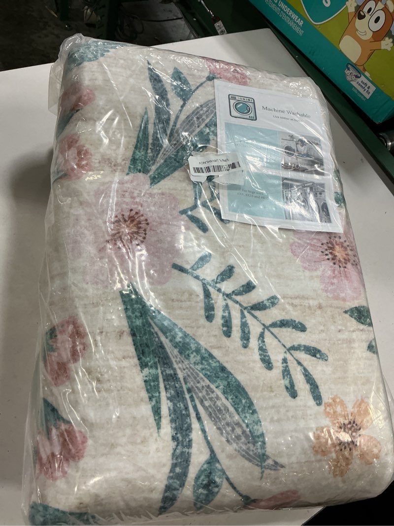Condition photo showing New/Like New for shacos pink floral area rugs 5x7 nursery rug, machine washable boho rugs for bedroom, non slip soft floral low-pile carpet for living room kids room dining room entryway indoor