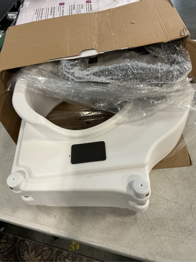 Condition photo showing As Is for bath safetyraised toilet seat product description: elev.toilet seat w/ remarms,rtl,1 ea