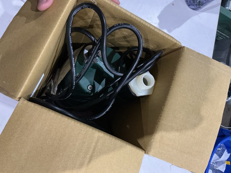 Condition photo showing As Is for zoeller 1/3 hp 2100 gph thermoplastic electronic switch bottom ac submersible utility pump