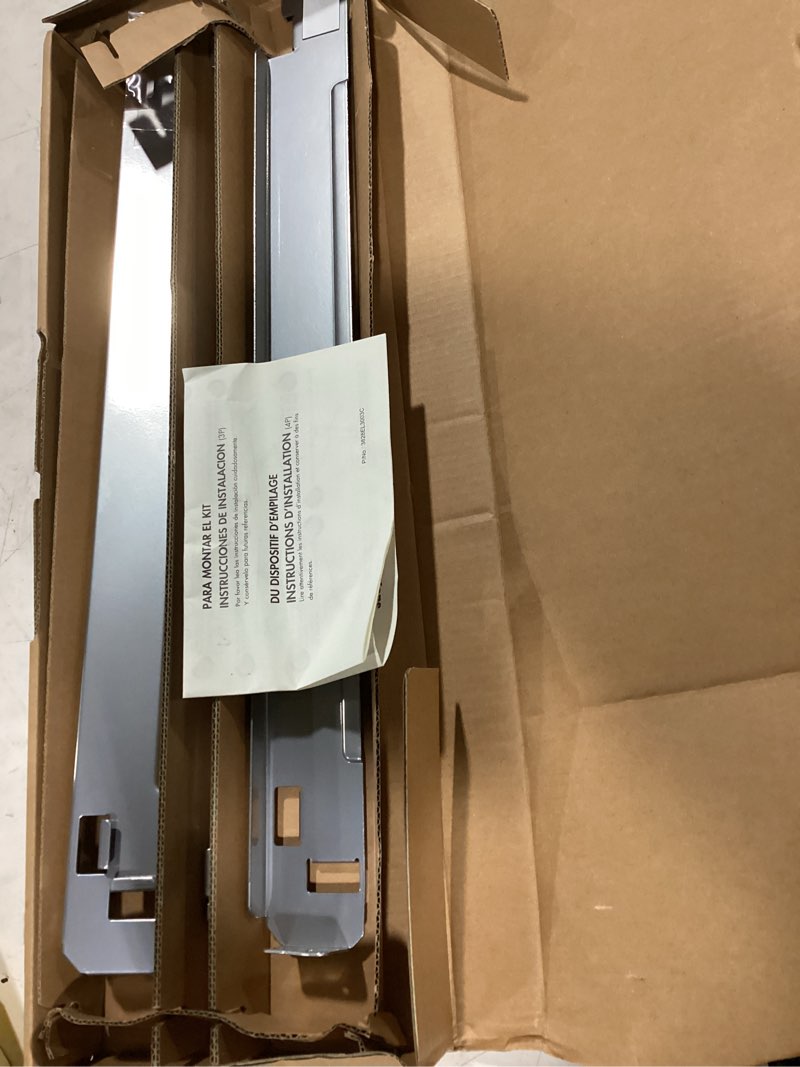 Condition photo showing As Is for lg 27'' laundry front load stacking kit