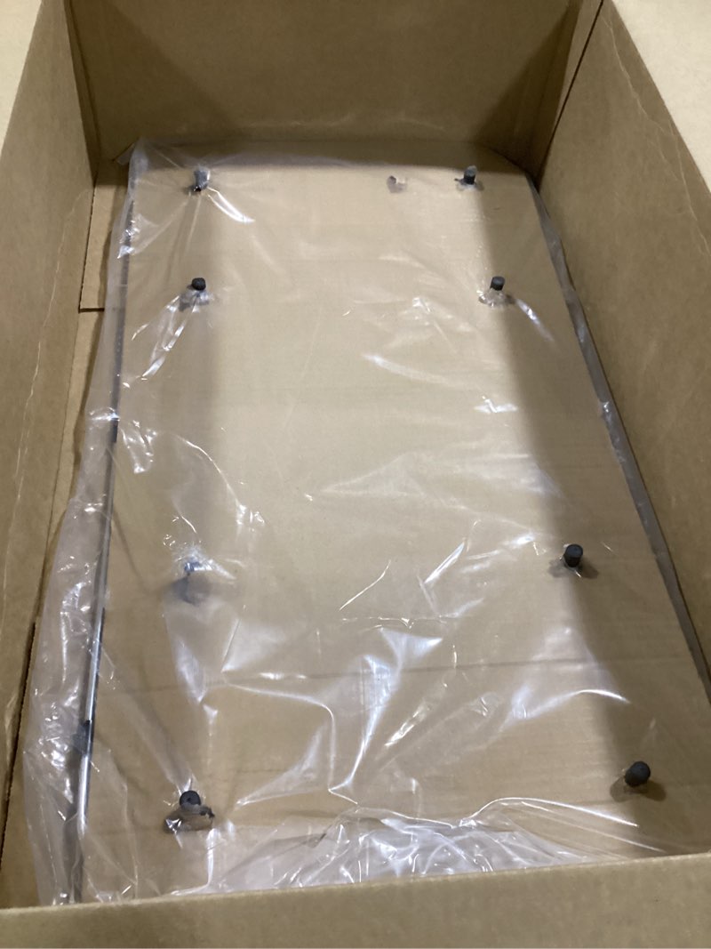 Condition photo showing As Is for sink protector grid 26-1/16" x 14-1/16", centered drain with corner radius 3-1/2", 304 stainless steel material sink grid - centered drain 26-1/16" x 14-1/16" centered drain