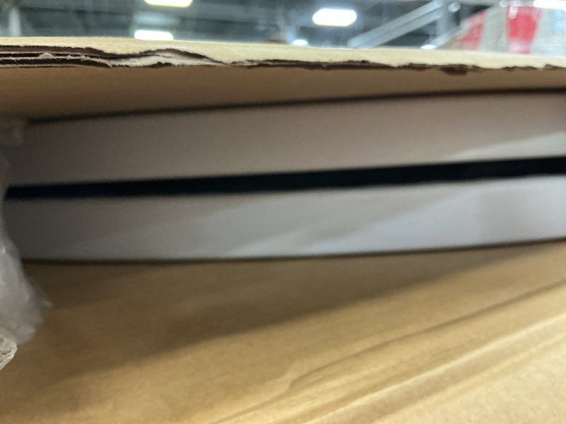 Condition photo showing As Is for Flash Furniture Scarborough 5-Foot Round Bi-Fold White Plastic Folding Table with Carrying Handle