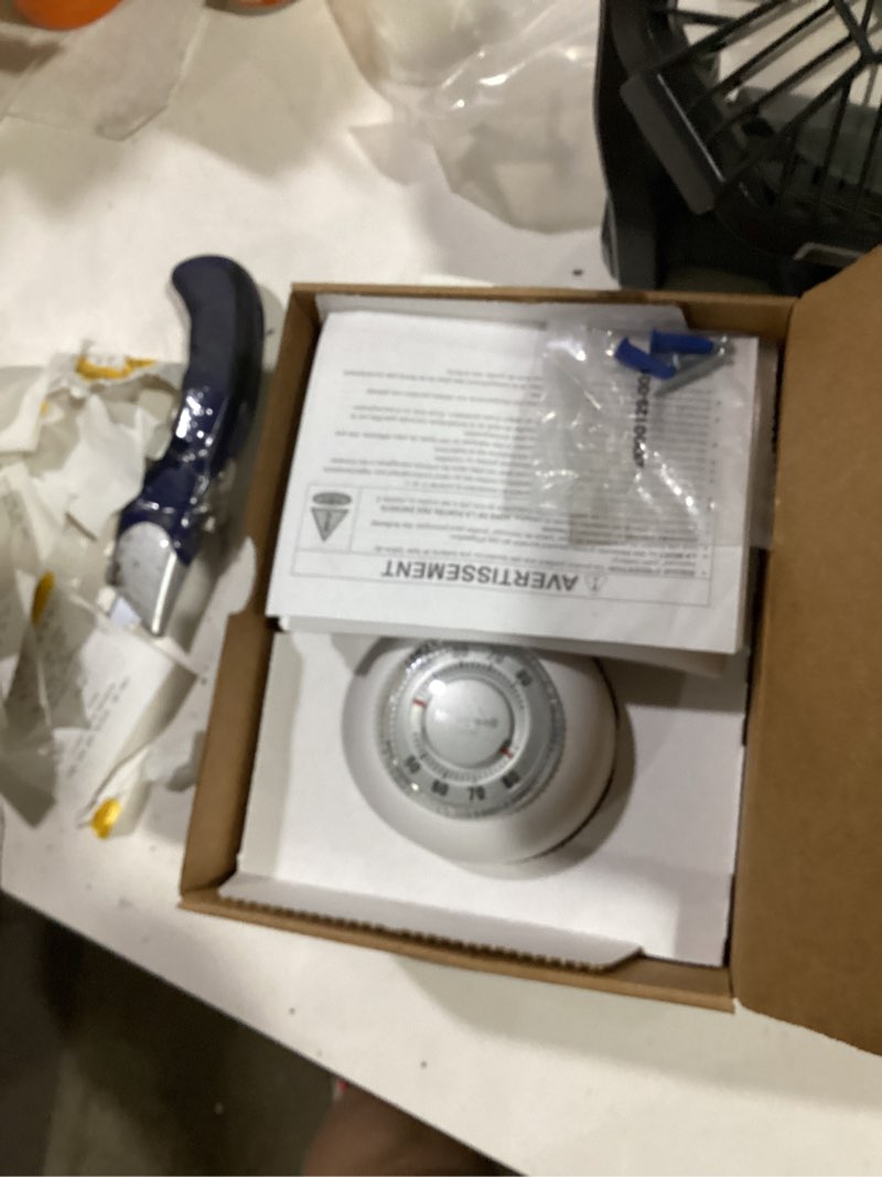 Condition photo showing As Is for honeywell the round mechanical non-programmable thermostat