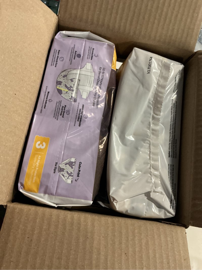 Condition photo showing New/Like New for the honest company comfort dry overnight diapers, up to 12 hours protection, hypoallergenic, cozy cloud + star signs, club box size 3 (16–28 lbs), 52 count size 3 52
