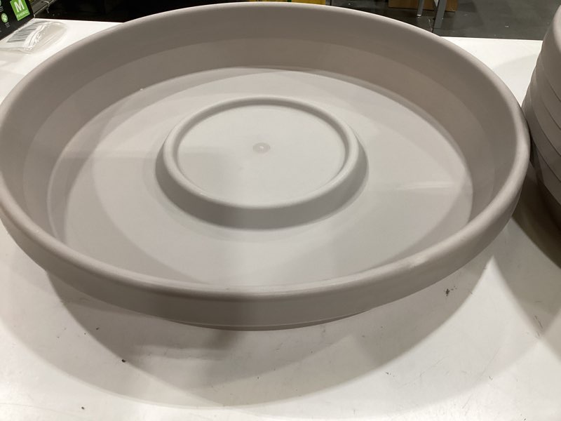Condition photo showing Good Condition for bloem living 24 terra pebble stone saucer