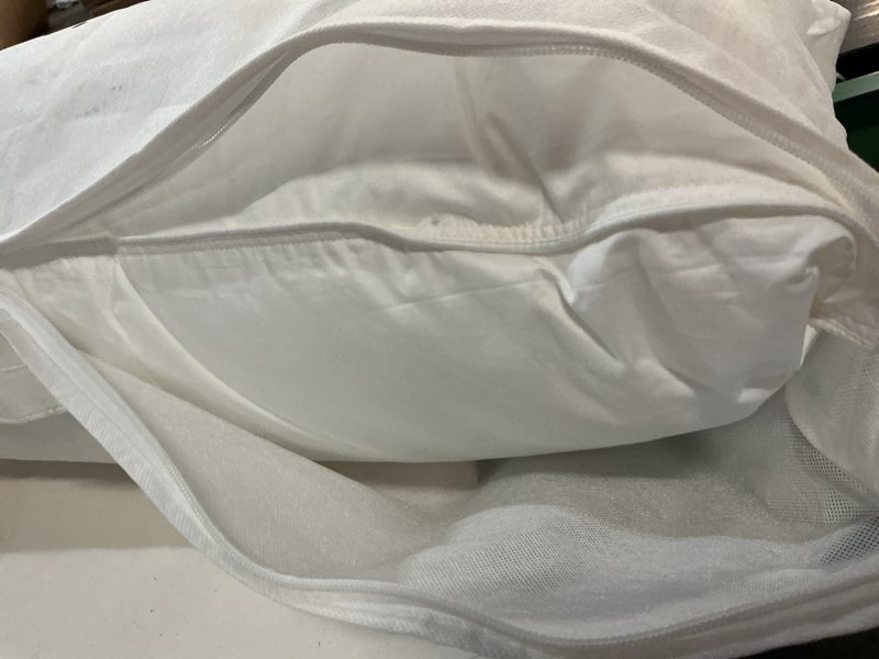 Condition photo showing As Is for premium down alternative pillow, king, medium/firm