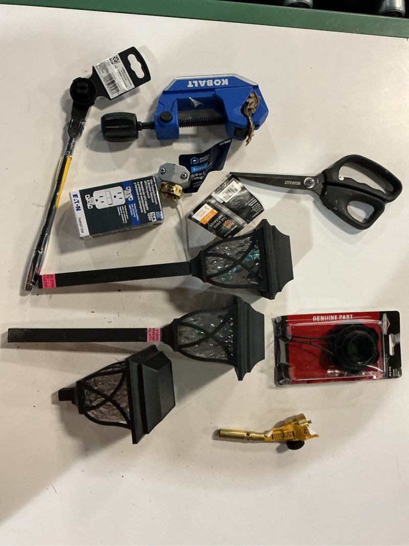 Condition photo showing As Is for assorted home improvement lot ( small tools, screws, home accessories)