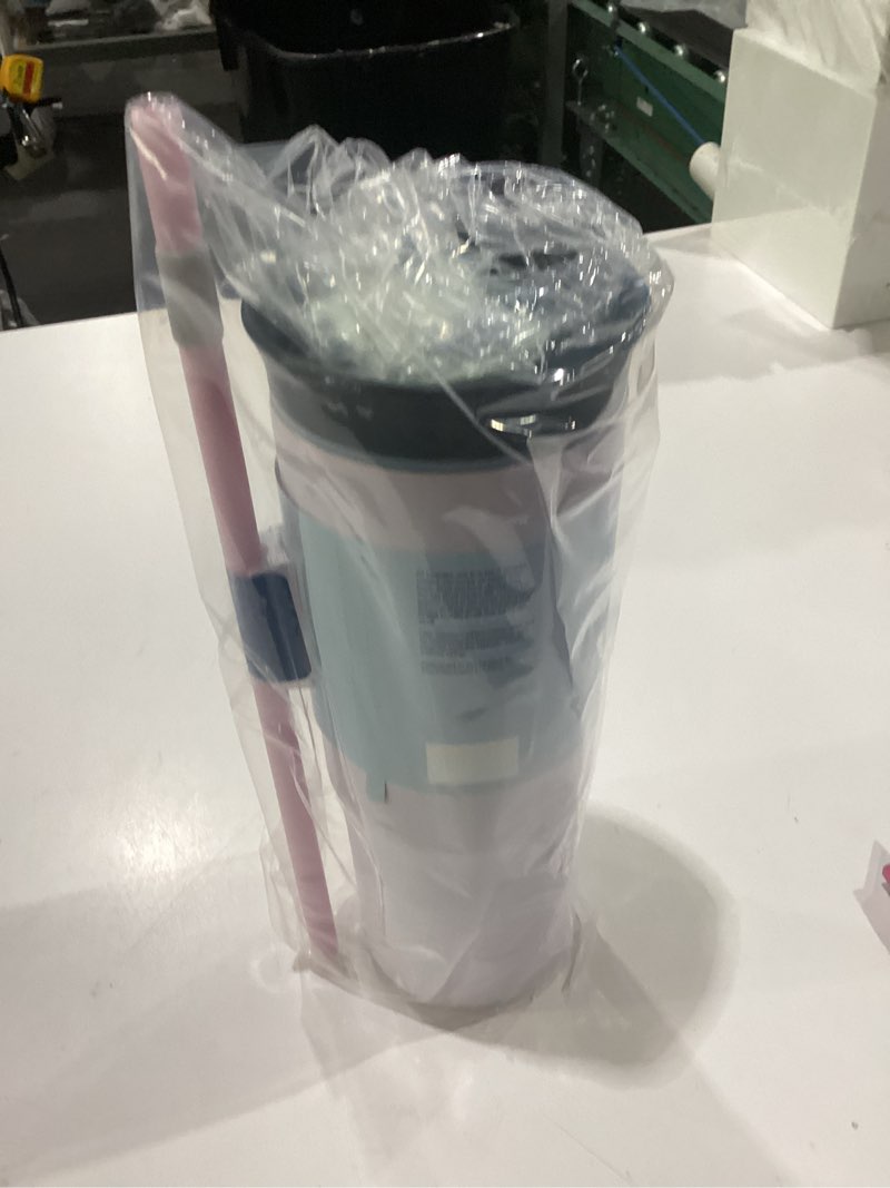 Condition photo showing New/Like New for owala stainless steel triple layer insulated travel tumbler with spill resistant lid and straw, bpa free, 24 oz, grey/purple (bunny hop) bunny hop 24 ounces (pack of 1)