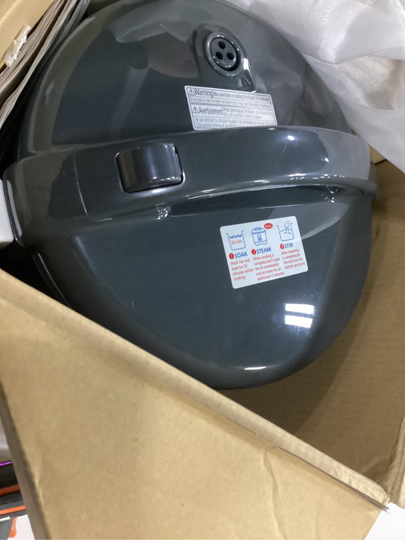 Condition photo showing Good Condition for Tiger JNP-S18U-KY 10 Cup Capacity White Rice Cooker with Non-Stick Inner Pot, Retractable Power Cord, and Keep Warm up to 12 hours (Obsidian Black)