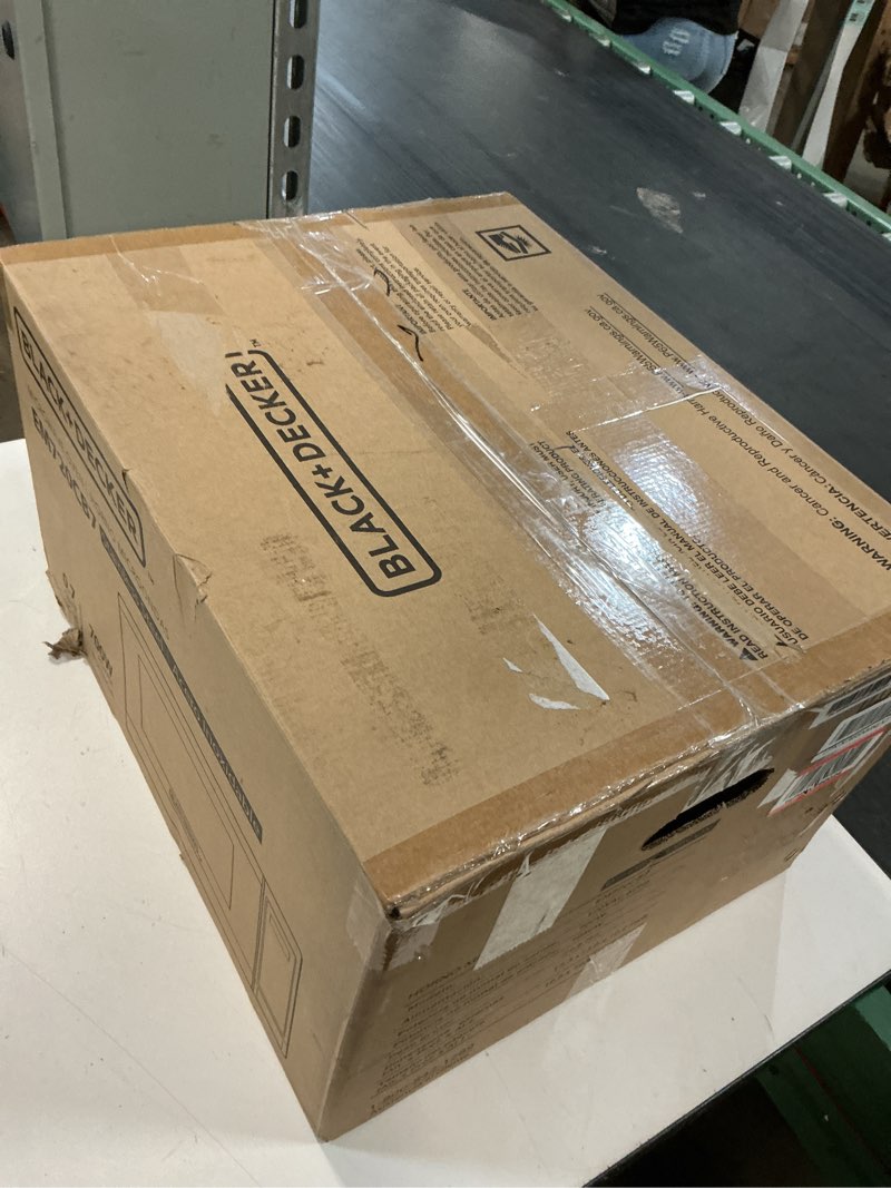 Condition photo showing As Is for black+decker em720cb7 digital microwave oven with turntable push-button door, child safety lock, 700w, stainless steel, 0.7 cu.ft 0.7 cu. ft.