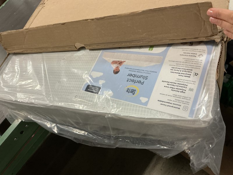 Condition photo showing Good Condition for serta perfect slumber dual sided crib and toddler mattress - waterproof - hypoallergenic - premium sustainably sourced fiber core -greenguard gold certified (non-toxic) -7 year warranty - made in usa