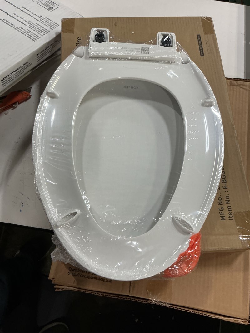 Condition photo showing New/Like New for kohler k-4774-0 brevia elongated white toilet seat with quick-release hinges and quick-attach hardware for easy clean, white