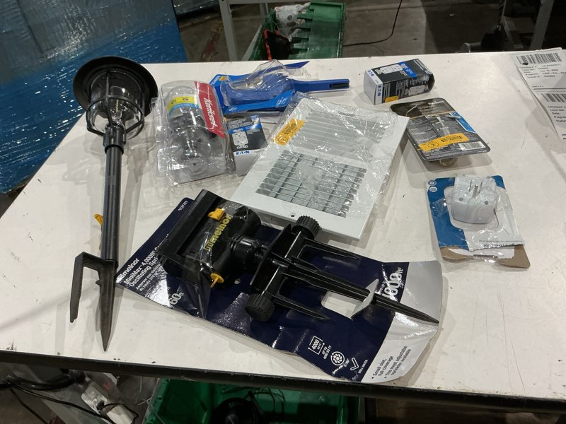 Condition photo showing As Is for assorted home improvement lot (small tools, screw, home accessories, etc.)