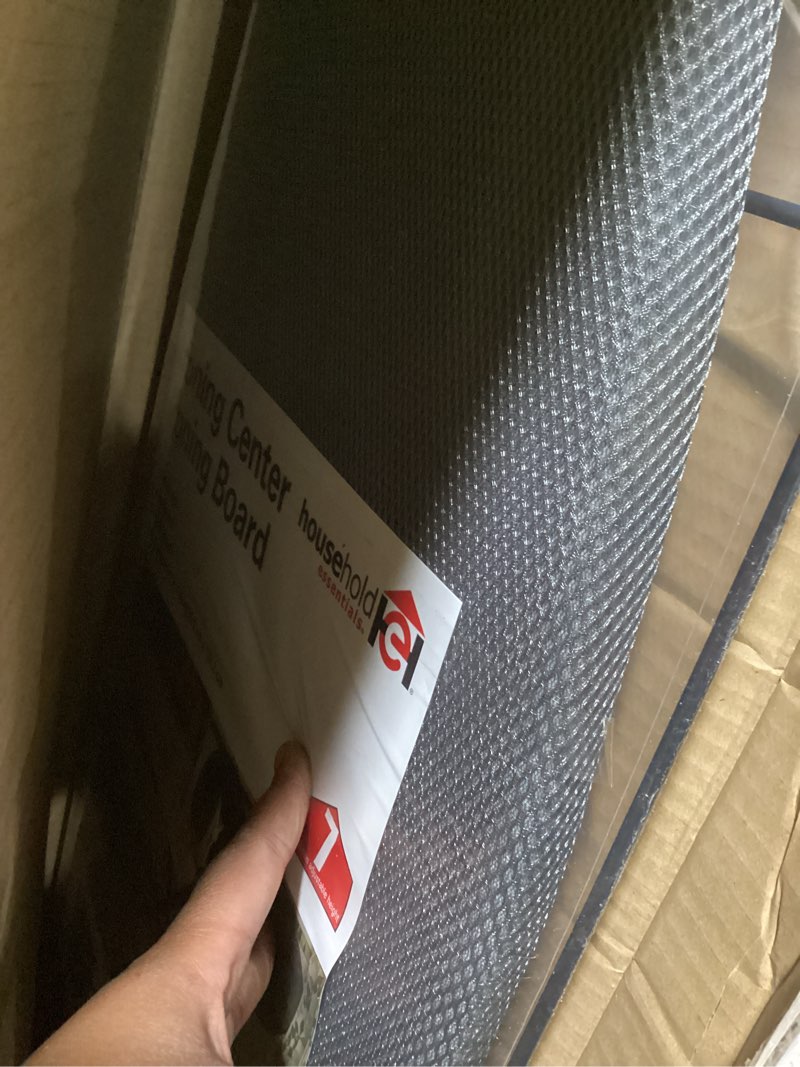 Condition photo showing Good Condition for household essentials deluxe matte black ironing board with mesh steel top, 4 durable hex legs, heat-