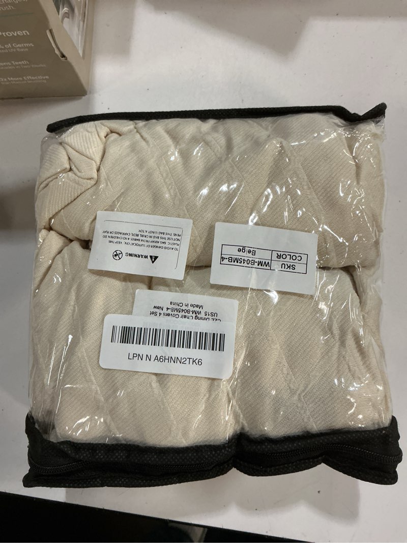 Condition photo showing New/Like New for CZL Dining Chair Seat Covers for Dining Room Chairs with Armrest Set of 4, Upgraded Zipper Kitchen Chair Seat Covers Water Repellent, Washable Jacquard Stretch Chair Covers, Beige, Set of 4