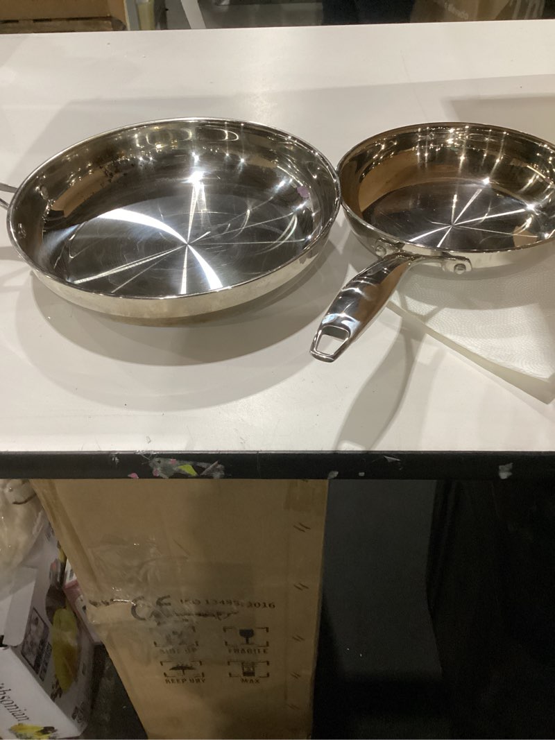 Condition photo showing As Is for Amazon Basics 2-Piece Oven Safe, Riveted Handle Stainless Steel Induction Frying Pan Set - Silver, 8