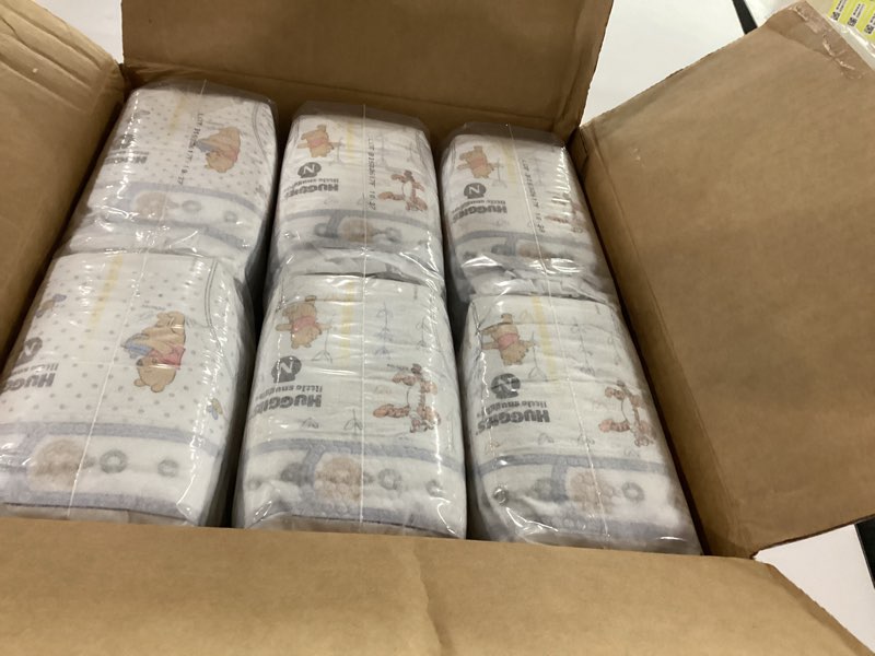 Condition photo showing New/Like New for huggies size newborn diapers, little snugglers baby diapers, size newborn (up to 10 lbs), 144 count, packaging may vary