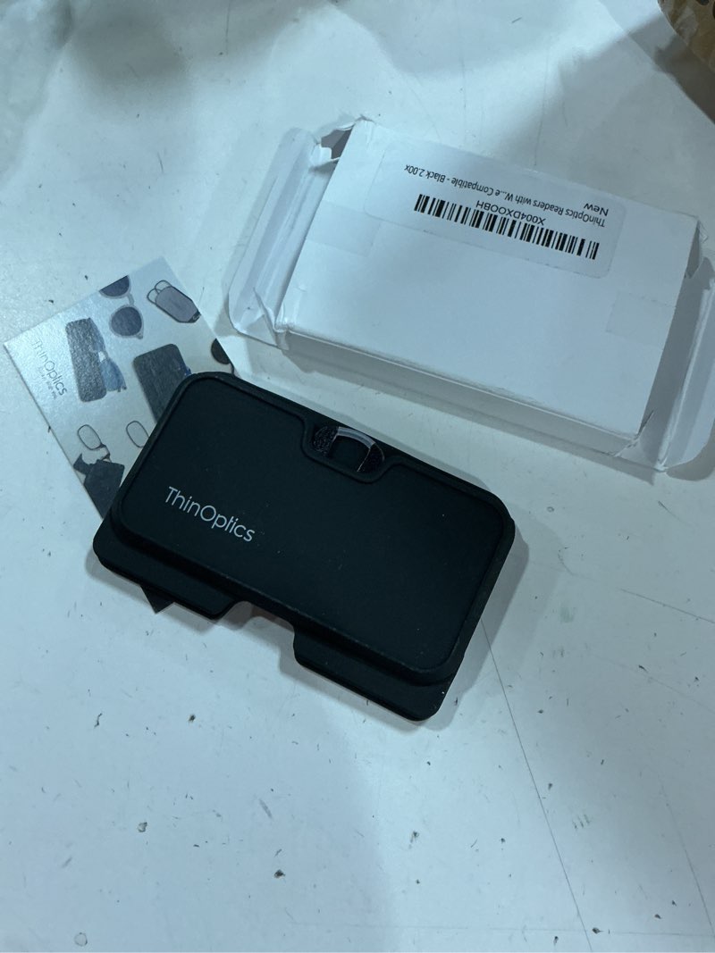 Condition photo showing New/Like New for thinoptics readers with wallet - armless on-nose reading glasses - slim wallet attaches to phone - magsafe compatible black case / black glasses 2.0 x