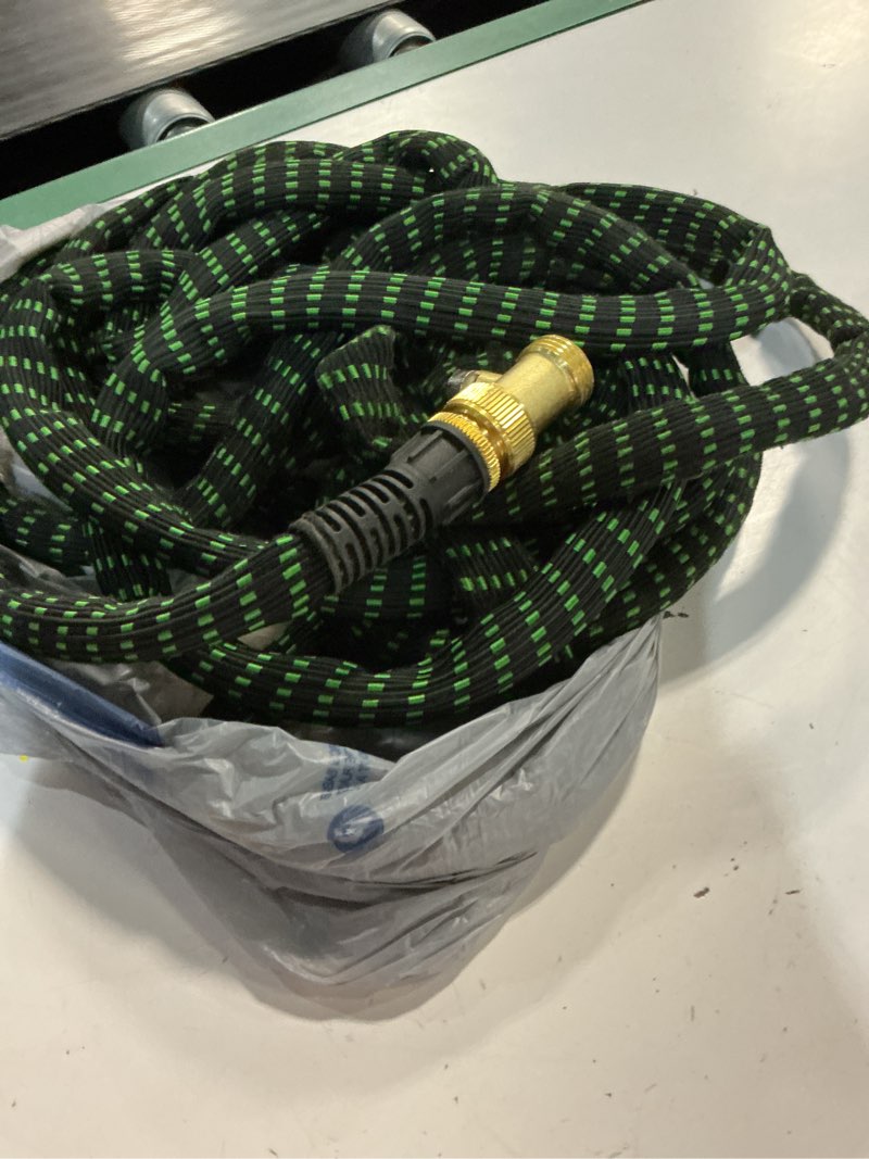 Condition photo showing As Is for 50' expanding garden hose w brass ends 3/4" adjustable black/green kink free50