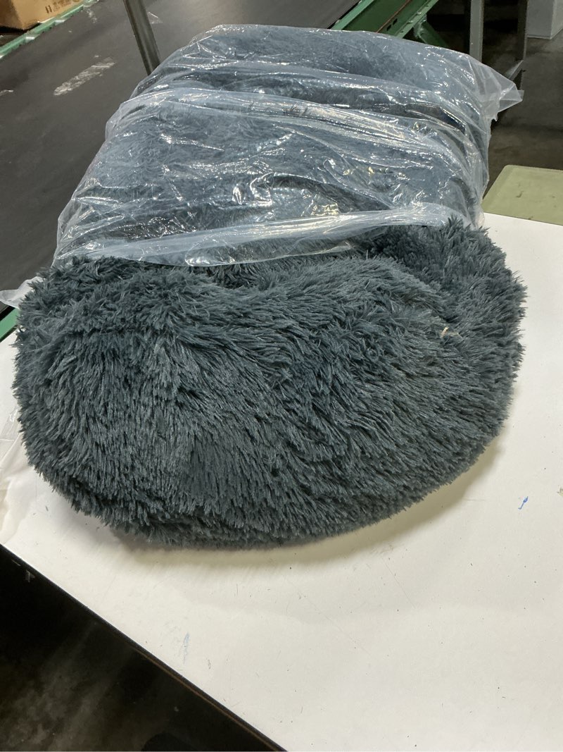 Condition photo showing Good Condition for PetJett Small Dog Bed - 23'' Round Dog Beds, Calming Anti-Slip & Washable Puppy Bed - Super Soft Fluffy Plush Faux Fur Pet Bed, Anti-Anxiety Premium Comfort Donut Bed, Fits Dogs upto 25 lbs, Dark Gray Dark Gray Small - 23”L x 23”W x 8”Th