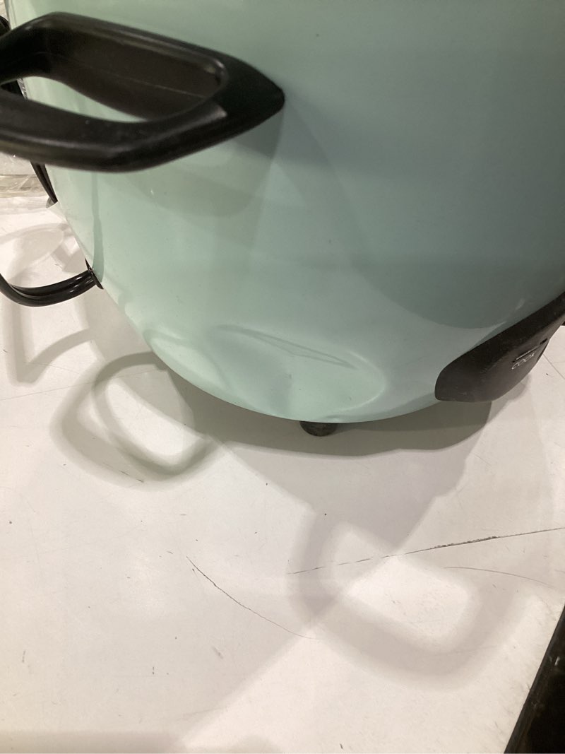 Condition photo showing As Is for (dented)aroma® 6-cup (cooked) / 1.5qt. rice & grain cooker (arc-743-1ngbl), light blue 6 cup cooked / 3 cup uncooked / 1.5 qt. light blue