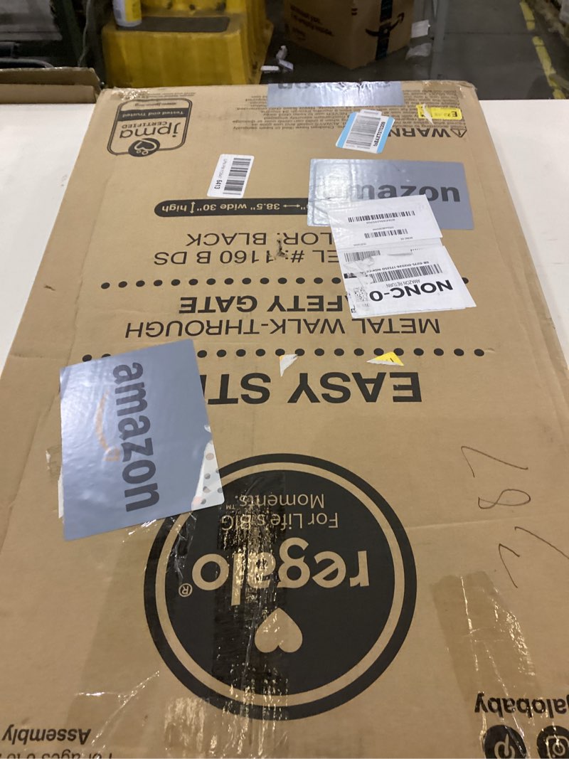 Condition photo showing As Is for Regalo Easy Step 38.5-Inch Wide Walk Thru Baby Gate, Includes 6-Inch Extension Kit, Pressure Mount Kit, Wall Cups, Black Black 29-38.5"W x 30"H