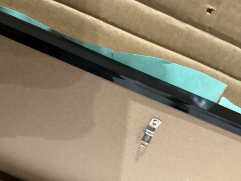 Condition photo showing As Is for lavie home 19.25x26.75 picture frame for wall display, 19.25x26.75 black puzzles frame with hd plexiglas, 19.25 x 26.75 frame 1 pack, display for vertical or horizontal, classic collection black 19.25x26.75 1