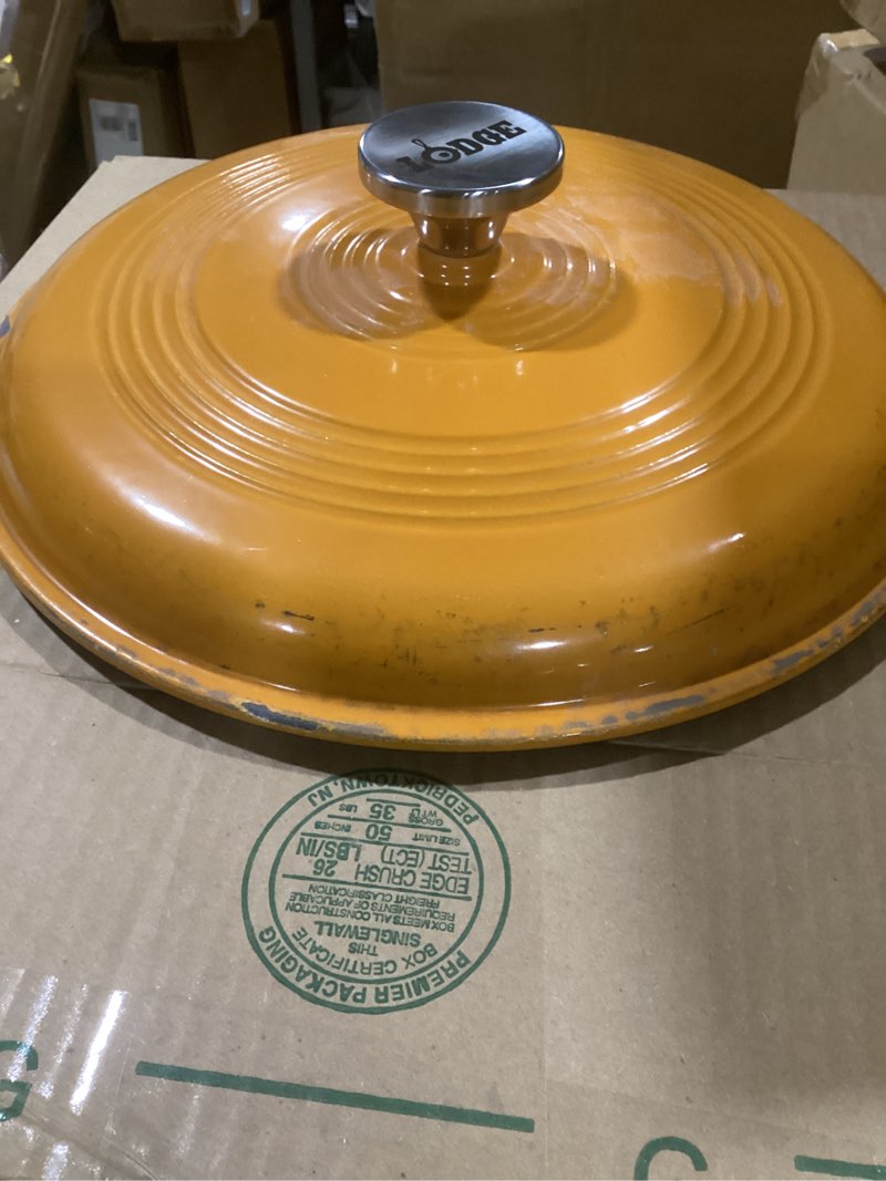 Condition photo showing As Is for lodge essential enamel cast iron dutch oven - perfect for bread baking, braising, marinating & slow cooking - features moisture-sealing lid & dual handles - kitchen essentials - 6 quarts - pumpkin 6 qt pumpkin