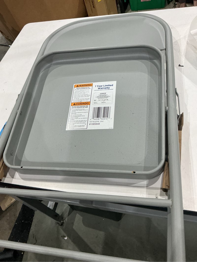 Condition photo showing As Is for cosco indoor gray metal solid standard folding chair