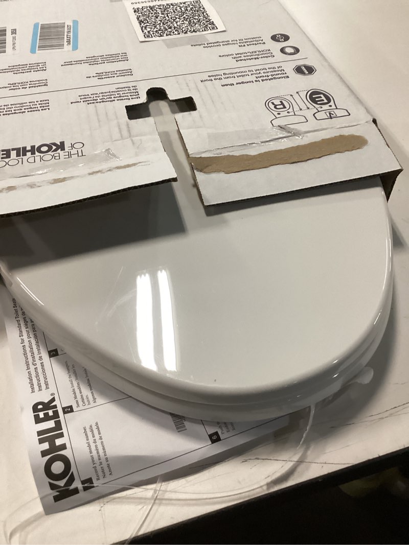 Condition photo showing As Is for kohler k-20110-0 brevia elongated toilet seat with grip-tight bumpers, quiet-close seat, quick-attach hardware, white