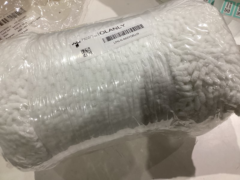 Condition photo showing New/Like New for OLANLY Bathroom Rugs 59x35, Extra Soft Absorbent Chenille Bath Rugs, Rubber Backing Quick Dry, Machine Washable Bath Mats for Bathroom Floor, Tub and Shower, Home Decor Accessories, White 59" x 35" White