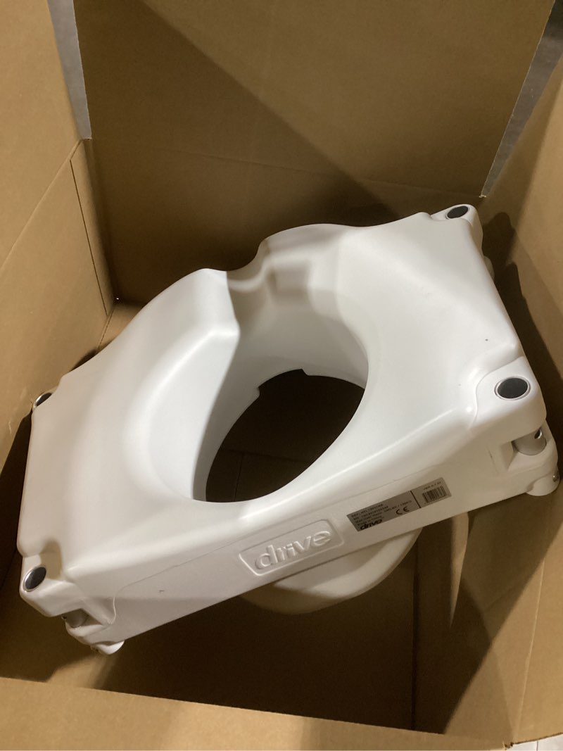 Condition photo showing As Is for Drive Medical 2-in-1 Raised Toilet Seat with Removable Padded Arms - Elevated Bathroom Safety Support - Secure Locking Attachment - Easy Height Assistance - Durable Plastic Construction Standard