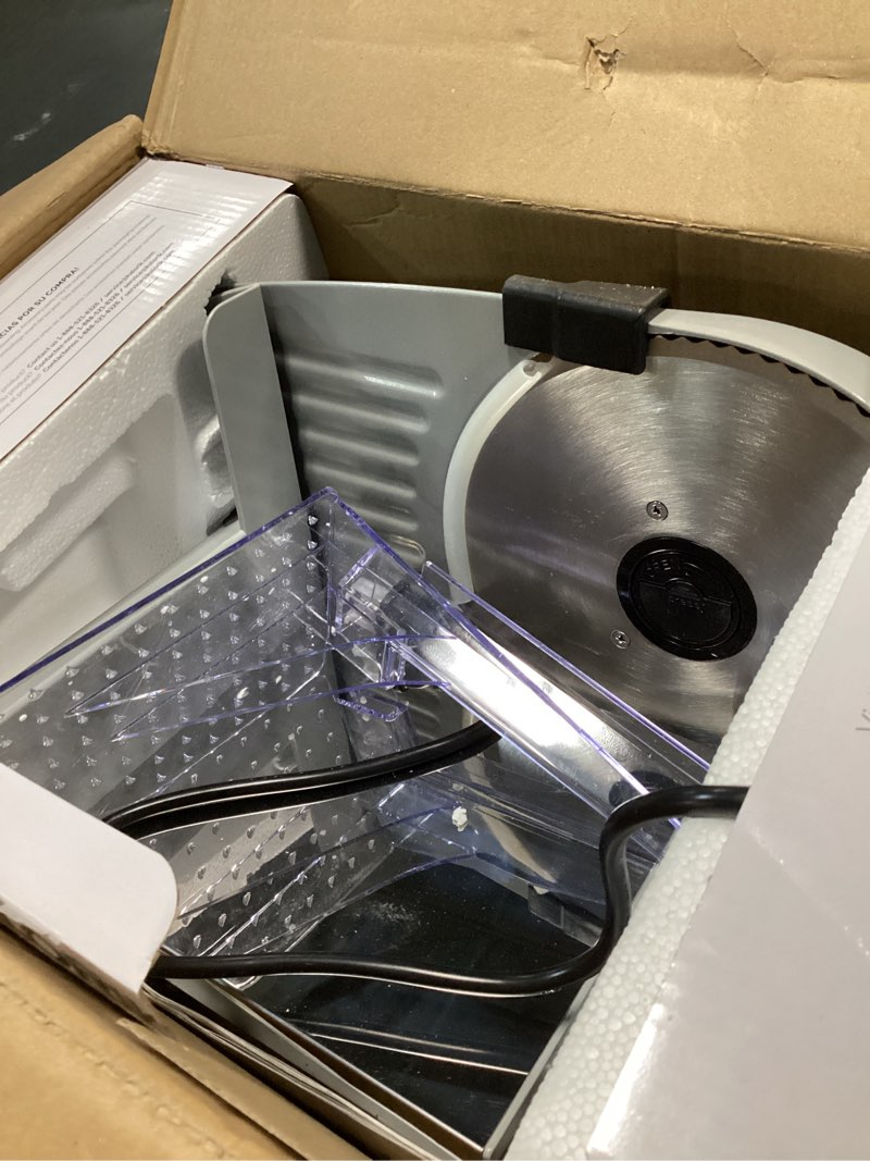 Condition photo showing As Is for Kalorik Professional Electric Food and Meat Slicer Features Adjustable Thickness Control & Safety Pusher with Thumb Guard, Easy Clean Removable 7.5-Inch Blade, 200-Watts, Silver 200-Watt Silver