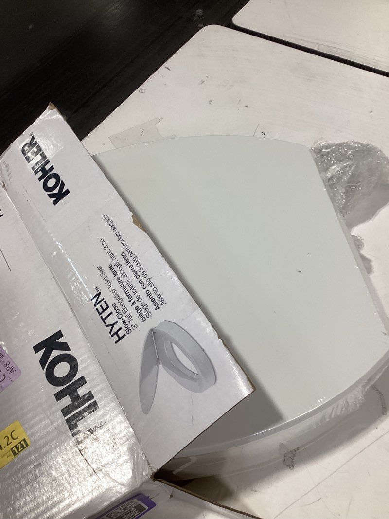 Condition photo showing New/Like New for KOHLER 25875-0 Hyten 3" Height, Elevated Soft Close Elongated Toilet Seat, Contoured Seat with Grip-Tight Bumpers, Quick-Attach Hardware, No Slam Toilet Seat, White White Elongated